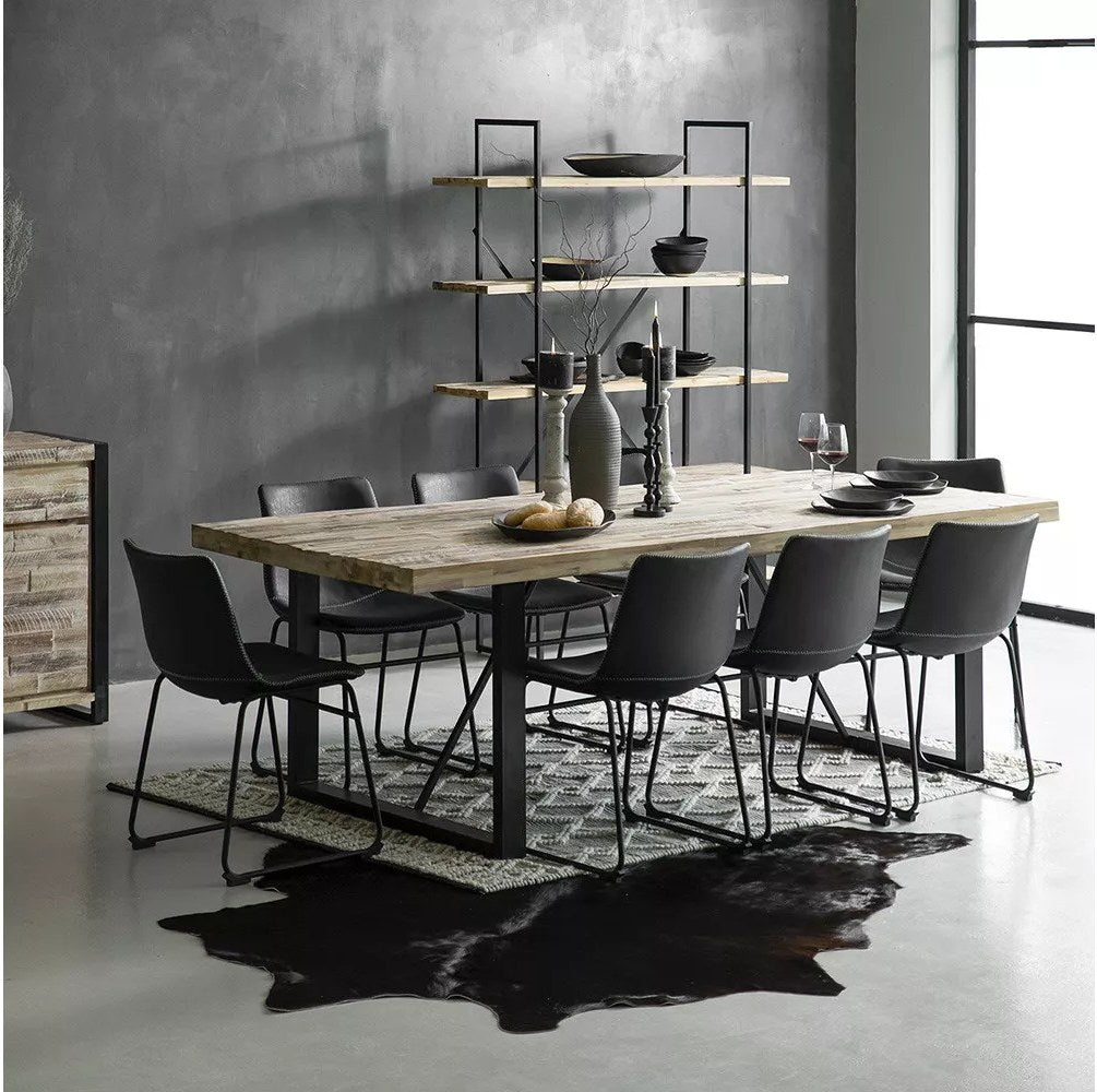 Modern dining room with wooden table and black chairs